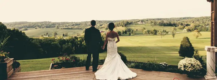 Couple walking the hilltop deck