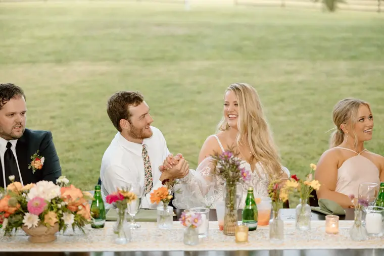 Laughing together at the head table
