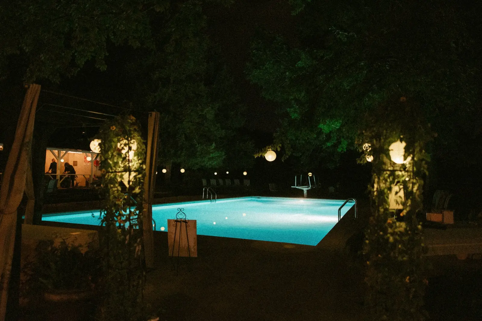 The pool lit at night