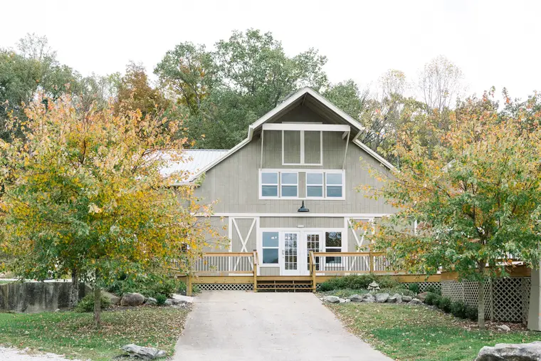 The estate barn from the drive in autumn